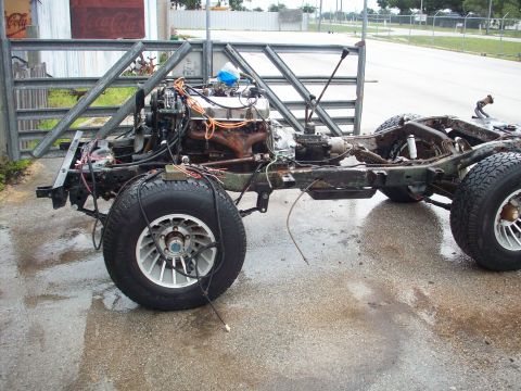 1978 Jeep CJ5 - The chassis and engine of a 1978 Jeep CJ5 are visible in this side view.
