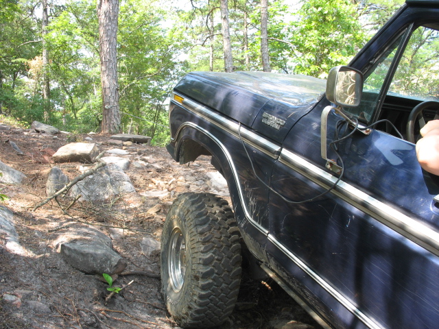1978 Ford Bronco fender and door on a rocky trail