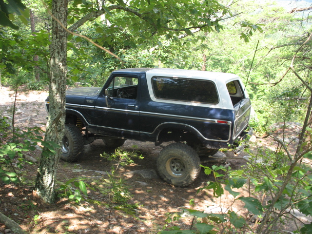 1978 Ford Bronco 3q-front view, dark blue and white, off-roading