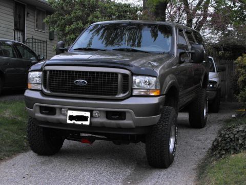2003 Ford Excursion - 6" Superlift w/ 35" tires.