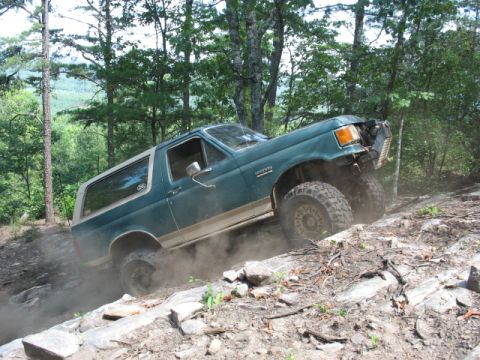 1978 Ford Bronco - This Ford Bronco navigates a challenging off-road trail.