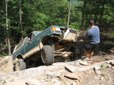 1978 Ford Bronco - Modified Ford Bronco navigating a challenging rocky off-road course.