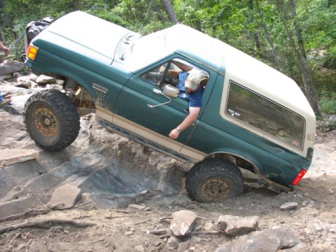 1978 Ford Bronco - This Ford Bronco navigates a challenging rocky terrain, demonstrating its off-road capabilities.