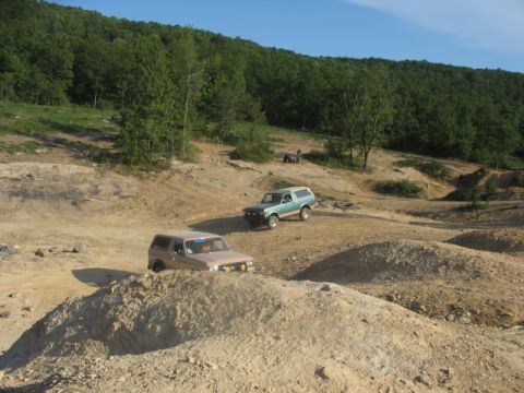 1978 Ford Bronco - Two 1978 Ford Broncos navigate a challenging off-road course.