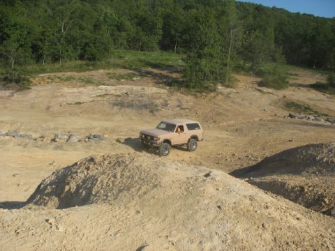 1978 Ford Bronco - 1978 Ford Bronco navigating off-road terrain.