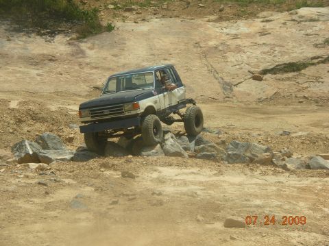 1991 Ford F-150 - Modified 1991 Ford F-150 navigates a rocky off-road course.