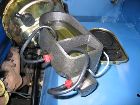1979 Ford Bronco - Master cylinder and brake booster assembly, likely from an older vehicle.