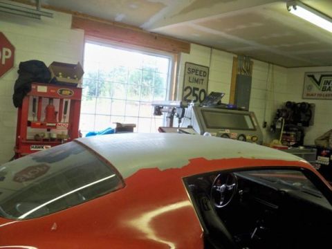 1974 Pontiac Firebird - Interior view of a 1974 Pontiac Firebird during restoration, showing the dashboard and roof.