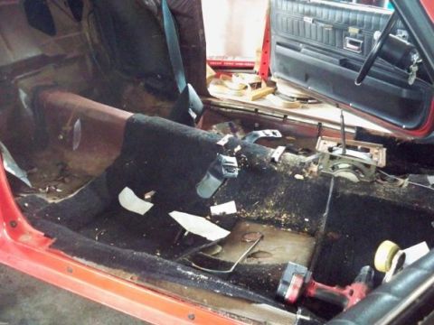 1974 Pontiac Firebird - Interior of a 1974 Pontiac Firebird undergoing restoration, with the carpet removed.