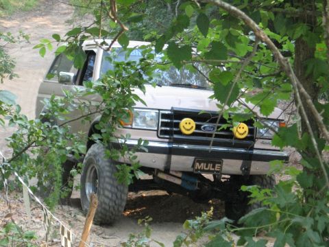 1978 Ford Bronco - This tan Ford Bronco, identified by its "MULE" license plate and smiley face lights, appears to be from the early 1980s, not 1978 as claime…