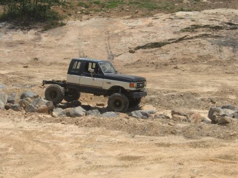 1978 Ford Bronco - This modified pickup truck navigates a rocky, off-road course.
