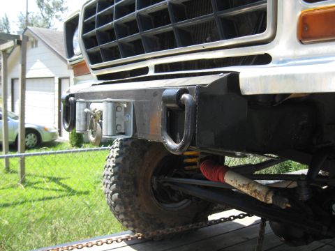 1978 Ford Bronco - Front view of a modified 1978 Ford Bronco, showing its heavy-duty bumper and off-road tire.