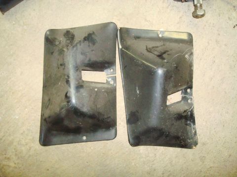 1995 Ford Bronco - Pair of black plastic bumper end caps shown from the front.