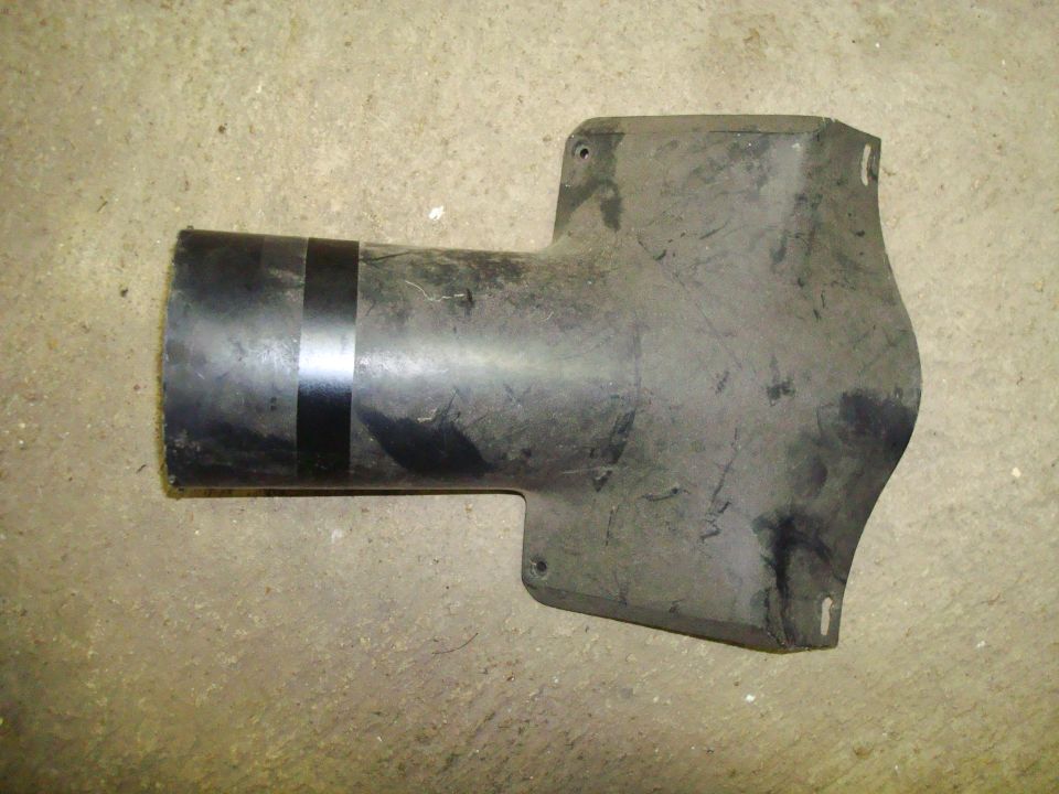 Black plastic automotive part with two silver bands on a cylindrical section