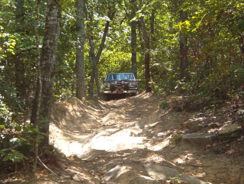 1983 Ford Bronco - Eventually, we got back to mapping the perimeter and continued down Upper Loop. The holes are severe & offset - no way I could climb this w…