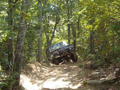 1983 Ford Bronco - Eventually, we got back to mapping the perimeter and continued down Upper Loop. The holes are severe & offset - no way I could climb this w…
