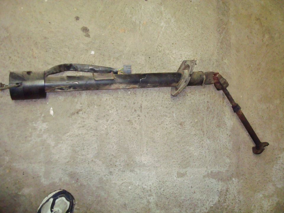 steering column assembly with wiring harness and linkage