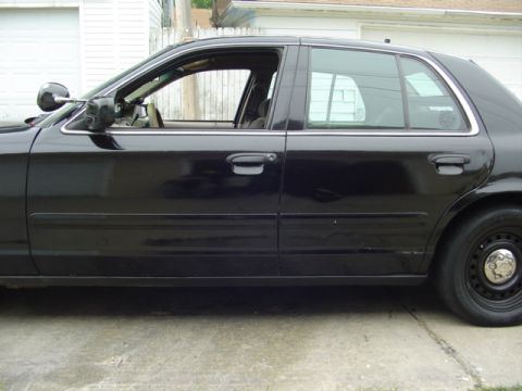 2000 Ford Crown Victoria - Added front door trim and replaced broken rear door trim.