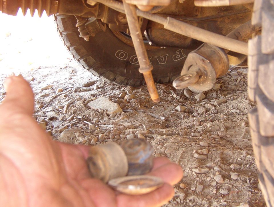 I decided to go over the short ledge above Rev Limiter & descend a trail seemoremud had taken, and I lost the threaded end of my L rear sway bar end link in the process.

*****UPDATE*****
Since I collected my old-but-sturdy poly bushings, it didn't take long to find a replacement end link in the JY & swap it on.