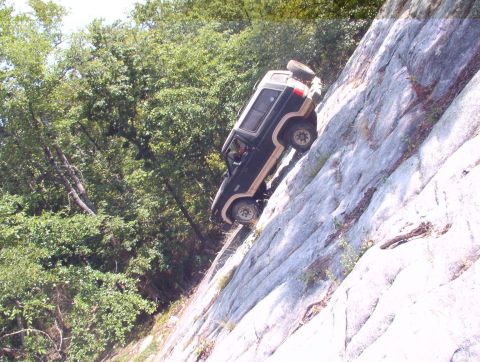 1983 Ford Bronco - Either Rescue needs his ears checked, or he's 'disposing of' some of his supplies. ...but it's still a cool pic!