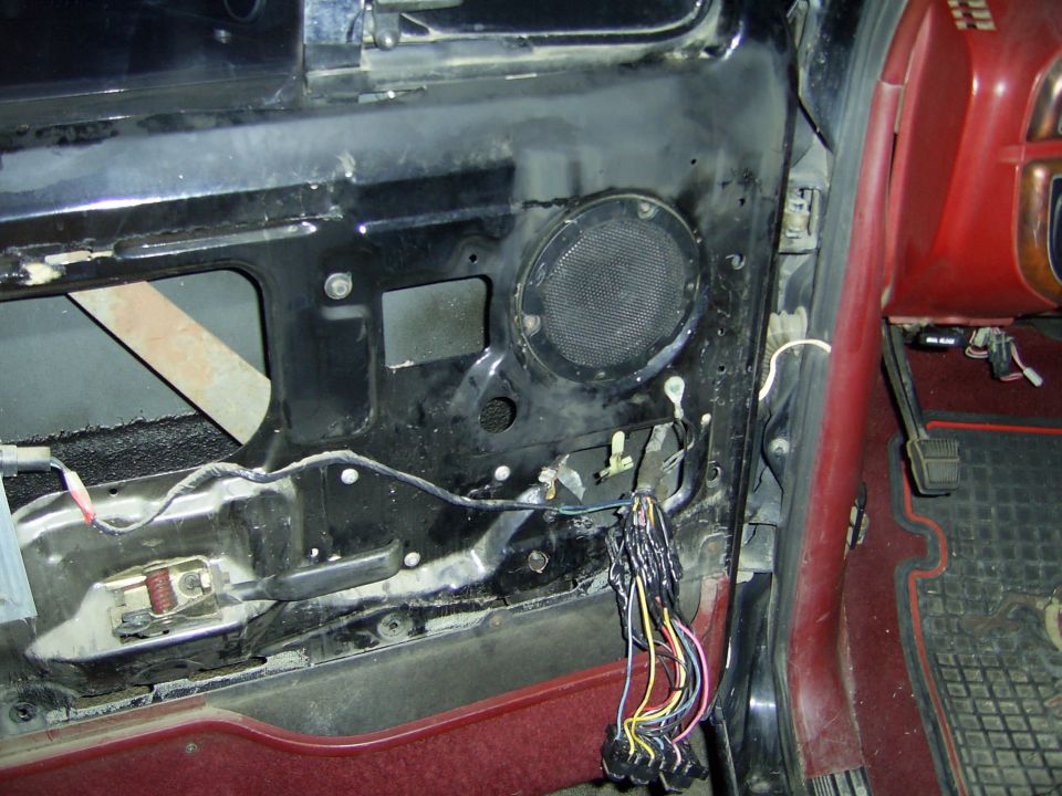 Each wire was pulled out and taped. It was a mess. It was all due to the dimples that were drilled out before I got it were jagged and it rubbed through the wiring harness. Be sure there is no sharp edges, I'm lucky all it got was my door panel.