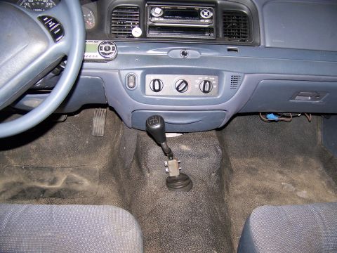 2002 Ford Crown Victoria - The trans is in and ready to go. Need to find a center console. Also need to clean the car.