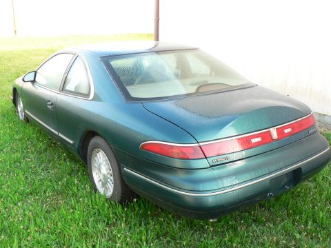 1990 Lincoln Mark VII - This Lincoln Mark VIII has a distinctive rear end with a full-width taillight bar.
