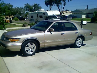 1997 Mercury Grand Marquis - New wheels and tires off 2006 Dodge Charger. Need to get some wheel spacer's.