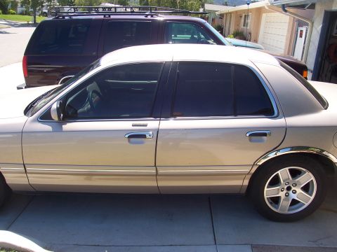 1997 Mercury Grand Marquis - 5% (Limo) back doors and rear window. 35% smoked front doors.