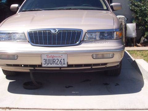 1997 Mercury Grand Marquis - 1997 Mercury Grand Marquis front end, showing grille, headlights, and license plate.