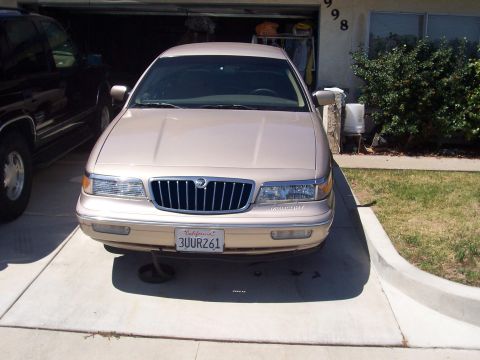 1997 Mercury Grand Marquis - I'm thinking about blacking out part of the grille. This is just edited on paint but I played with it with electrical tape before.