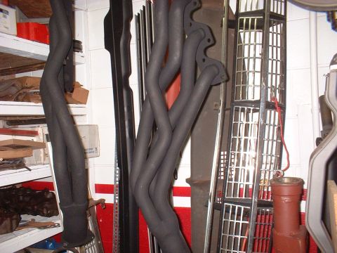 1970 Ford Torino - Exhaust headers and storage shelves are visible in this garage setting.