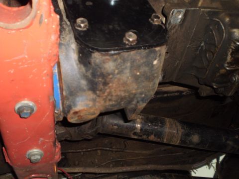 1978 Ford Bronco - Underside view of vehicle drivetrain components, showing rust and wear.