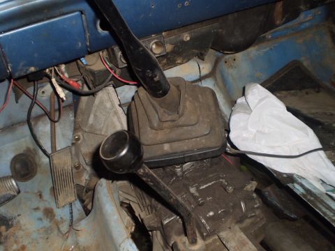 1978 Ford Bronco - Interior view shows the manual transmission and transfer case shifters, along with pedals and wiring.