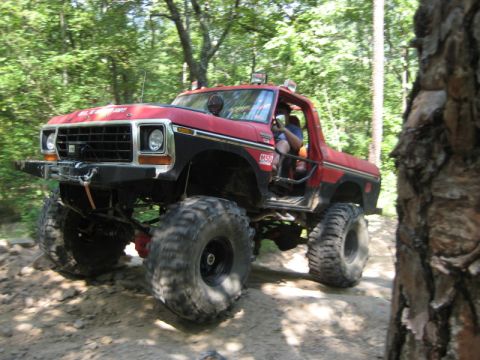 1979 Ford Bronco - Modified 1978 Ford Bronco navigating an off-road park trail.