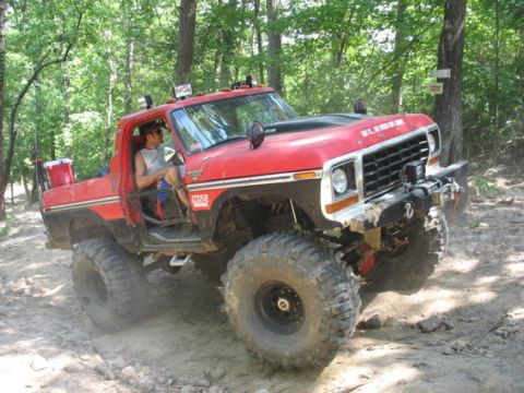 1979 Ford Bronco - This modified 1979 Ford Bronco navigates a rocky trail in an off-road park.