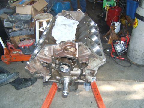 1988 Ford Bronco - An engine block is shown on a stand in a workshop environment.