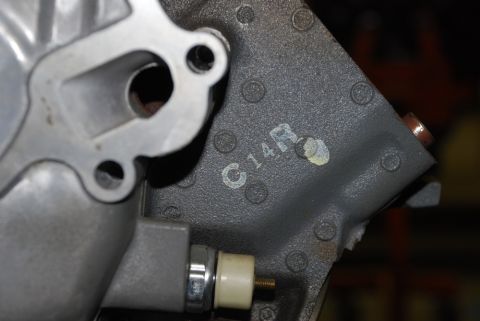 1996 Ford Bronco - Close-up of an engine block casting showing the 'C14R' identifier.