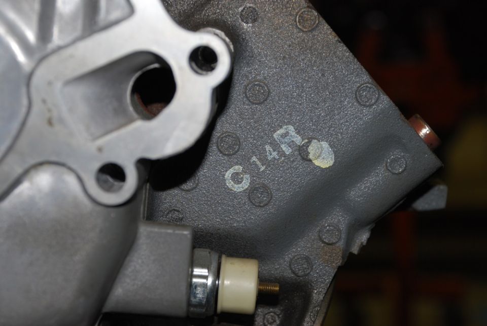 Engine block casting with C14R marking