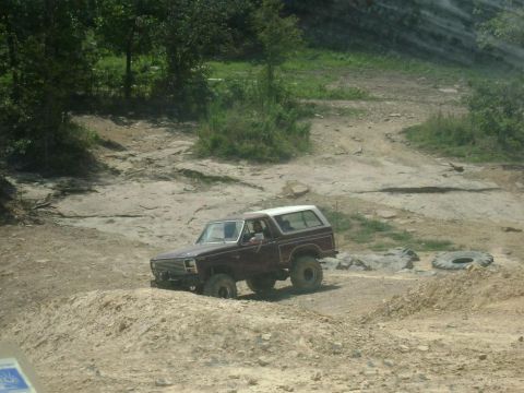 1990 Ford Bronco - This 1990 Ford Bronco is shown tackling a challenging off-road course.