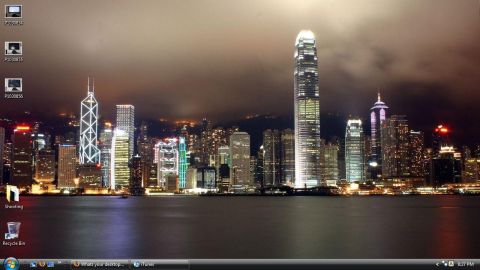 2006 Ford E350 - Night view of the Hong Kong skyline, numerous skyscrapers along the waterfront.