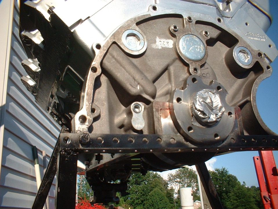 Engine block on stand, close-up of rear main seal area
