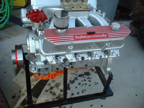 1969 Mercury Cyclone - Engine assembly with Holman Moody valve covers, mounted on a stand.