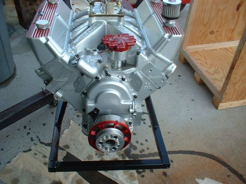 1969 Mercury Cyclone - A custom V8 engine is displayed on a stand, ready for installation.