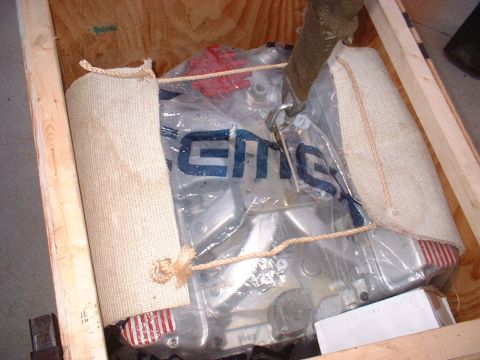 1969 Mercury Cyclone - Engine part in a wooden crate, secured with burlap and straps.