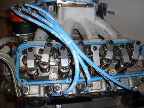 1995 Ford Bronco - Close-up view of an engine's valve train and spark plug wires.