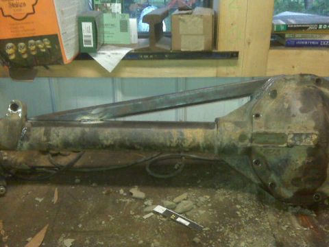 1992 Ford F-350 - This is a close-up of a rear axle assembly, likely undergoing some modification or repair.