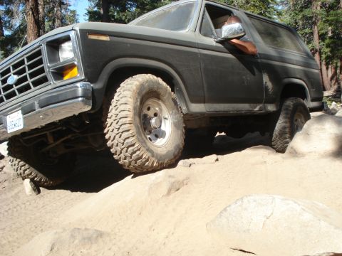 1984 Ford Bronco - This Ford Bronco navigates a rocky trail, its off-road capabilities.
