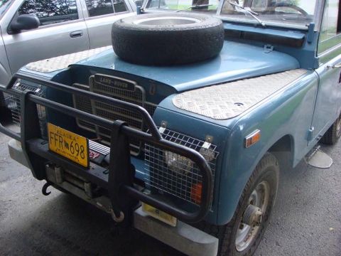 1972 Land Rover Land Rover - Front view of a 1972 Land Rover Land Rover, showing the spare tire mounted on the hood.