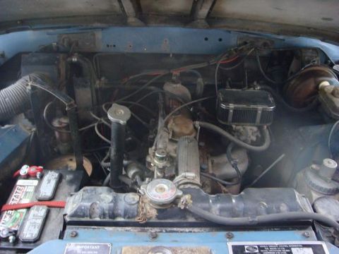 1972 Land Rover Land Rover - Close-up view of the engine compartment, showing various mechanical parts and wiring.
